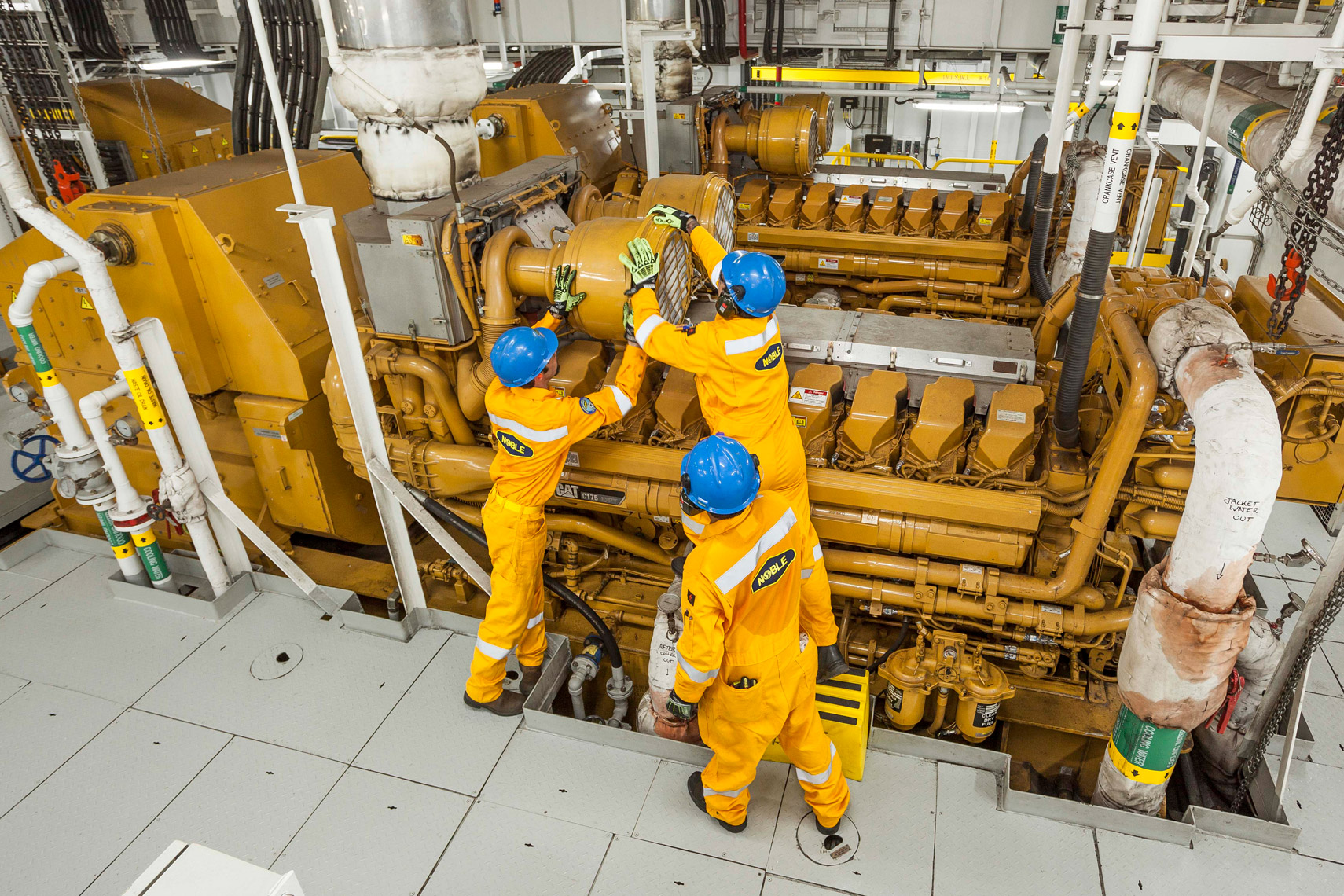 maintenance in oil rig engine room Singapore commercial photographer