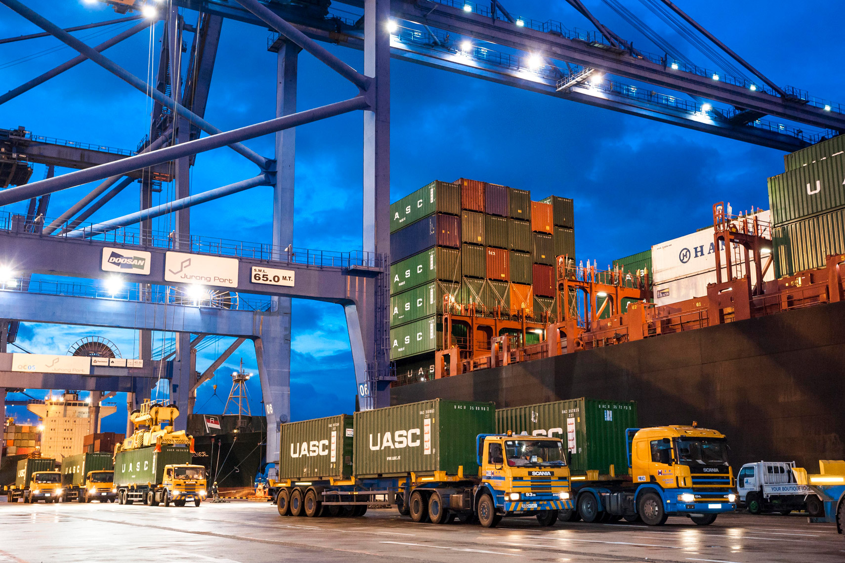 container ship port unloading activity Singapore shipping photographer